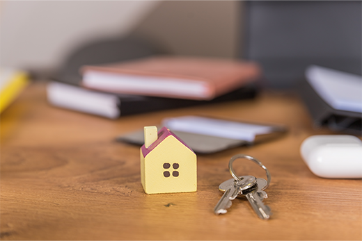 Keys and books on a table