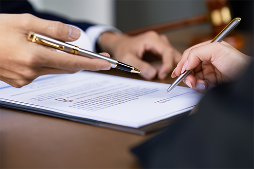 Two people negotiating at a table